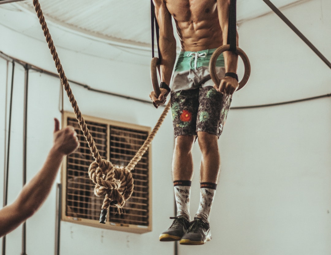 Man lifting weights, vibrant energy