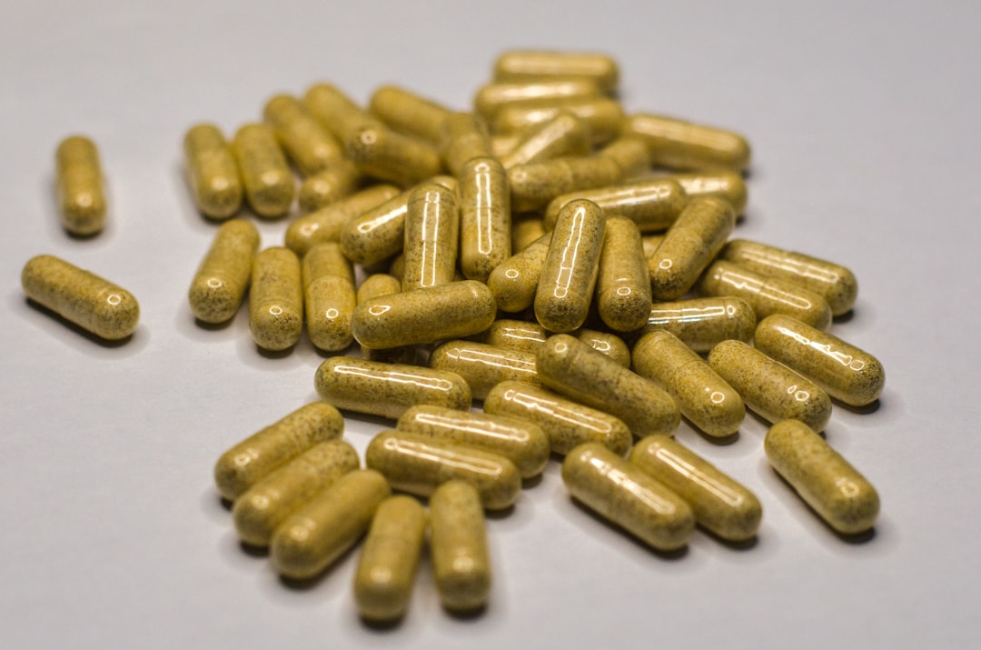 Person feeling energetic with a vibrant vitamin B complex bottle.
