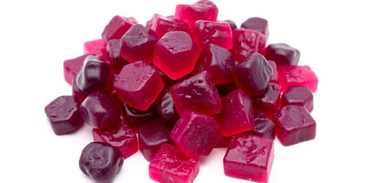 Elderberry and Vitamin C gummies on a white background.